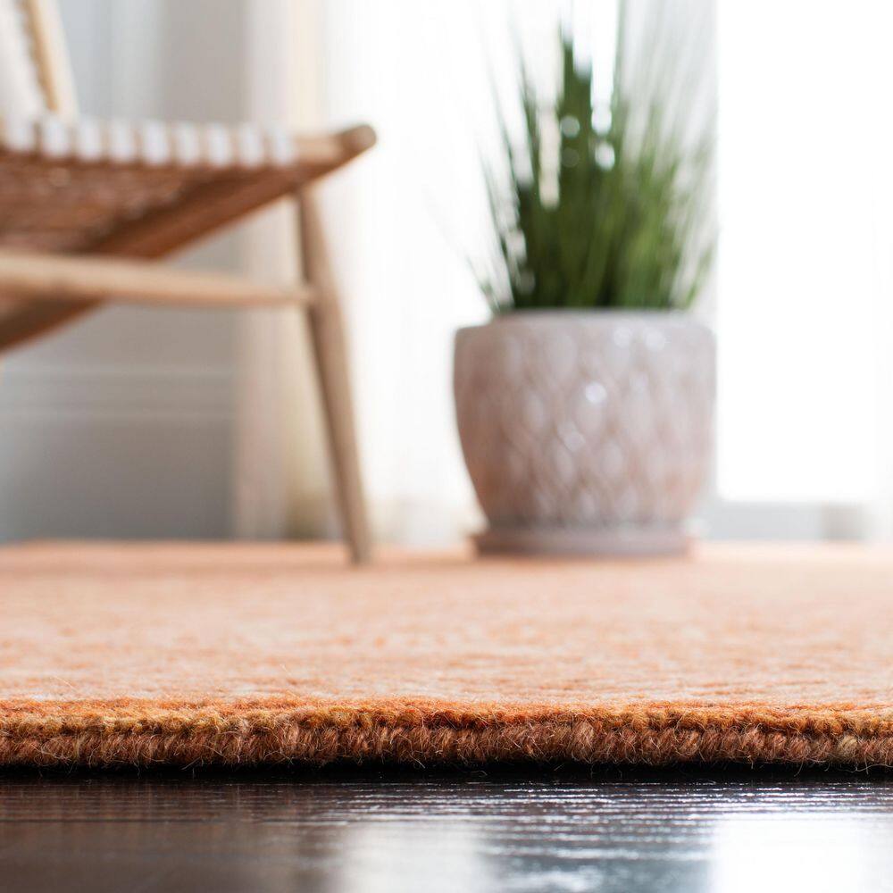 Handmade Rust Wool 8' x 10' Tufted Area Rug
