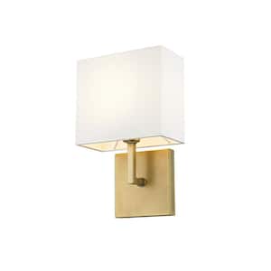 Saxon 7 in. 1-Light Rubbed Brass Interior Wall Sconce with White Fabric Shade