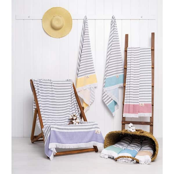 https://images.thdstatic.com/productImages/e37ae9b3-1ed5-4047-ad49-7d895caf7ed0/svn/yellow-american-soft-linen-beach-towels-med-3560-sar-pt2-d4_600.jpg