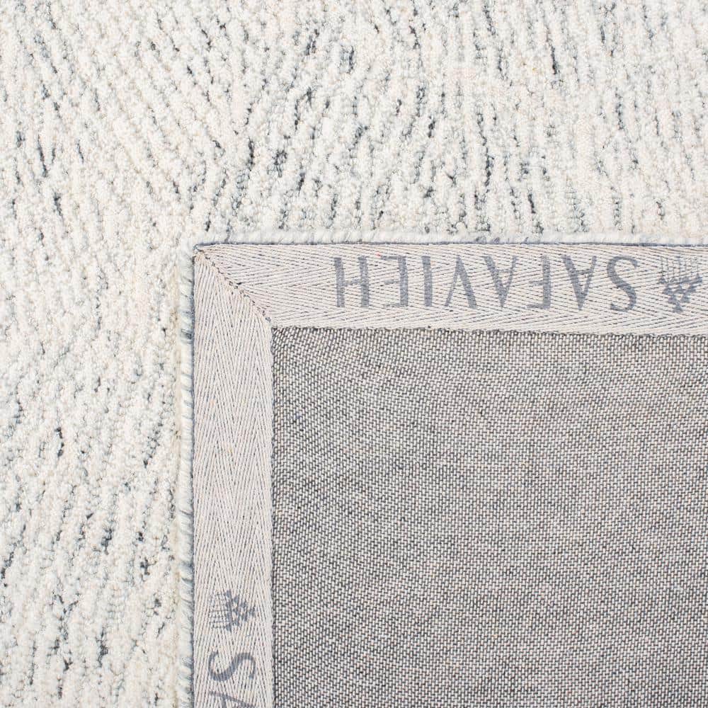 Handmade Dark Grey and Ivory Floral Wool Area Rug, 8' x 10'