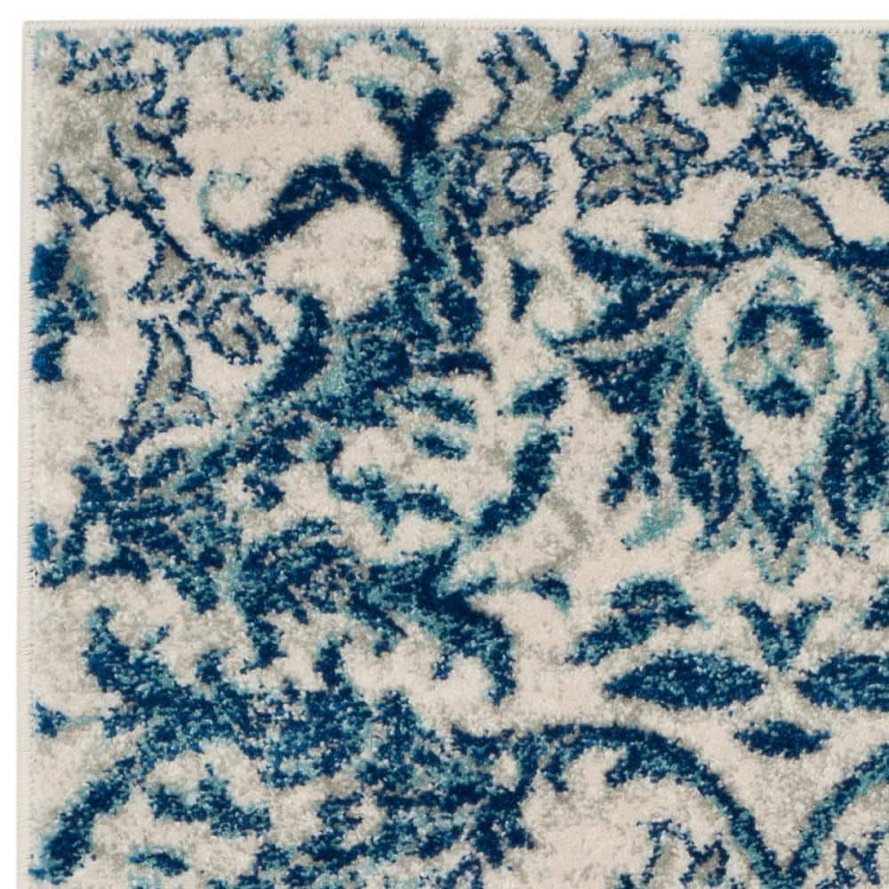 Ivory and Blue High Pile Synthetic Reversible Area Rug