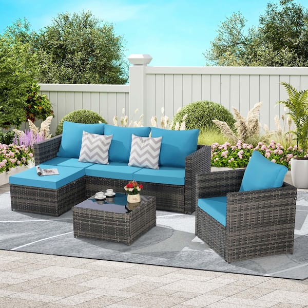 Zeus & Ruta 3-Piece Patio Wicker Conversation Set with Single Sofa Light Blue Cushions and Coffee Table for Backyard
