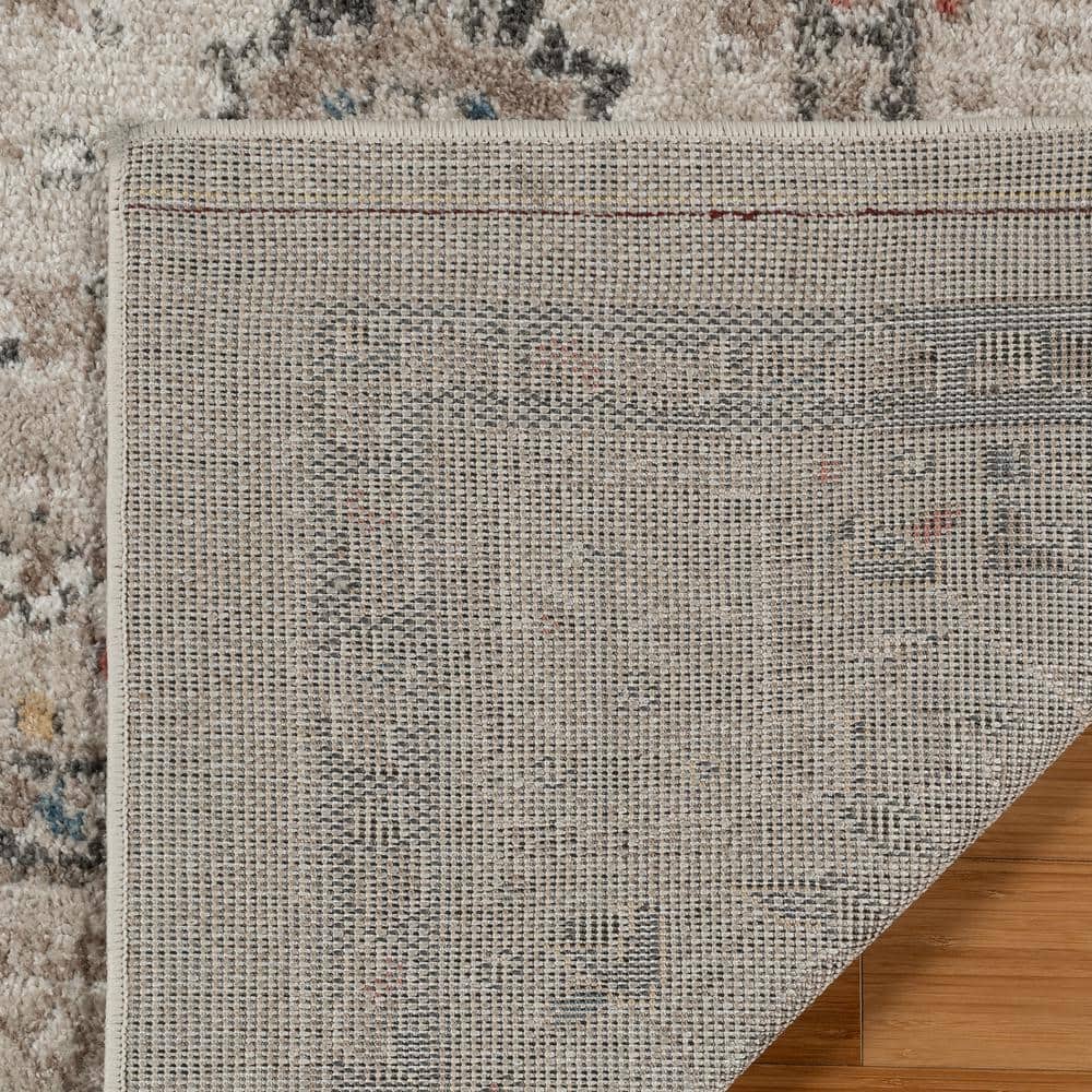 Ivory Tufted Rectangular 8' x 10' Synthetic Area Rug