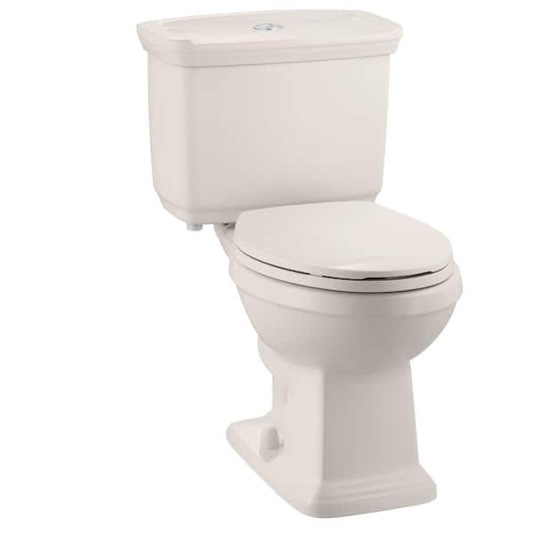 Glacier Bay 12 inch Rough In Two-Piece 1.0 GPF/1.28 GPF Dual Flush Elongated Toilet in Biscuit Seat Not Included