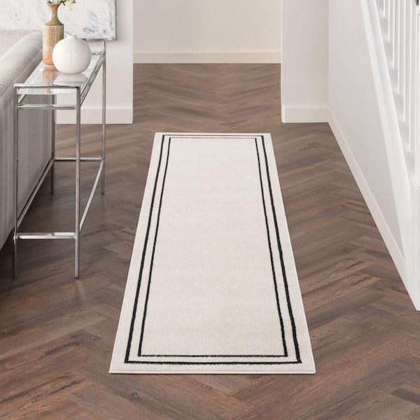 Nourison Essentials Ivory/Black 2 ft. x 6 ft. Solid Contemporary Runner Area Rug