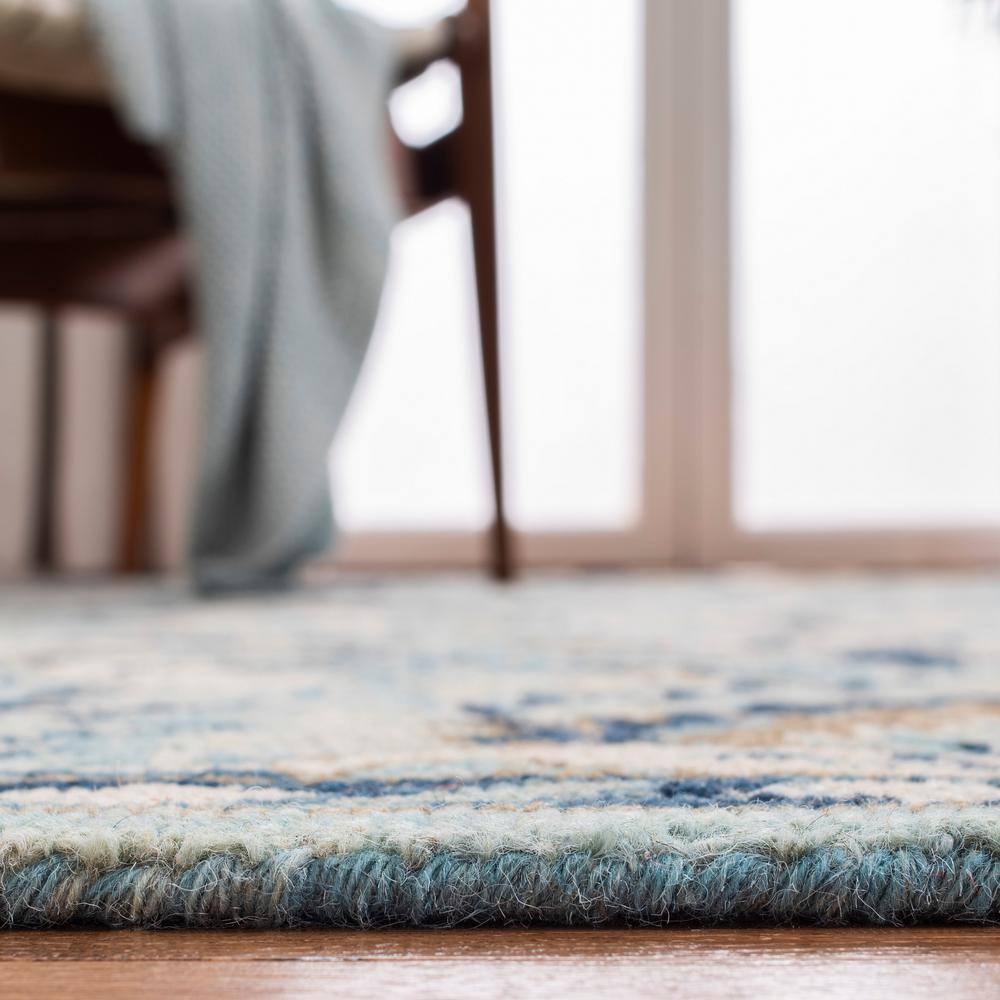 Blue and Ivory Floral Wool 9' x 12' Area Rug
