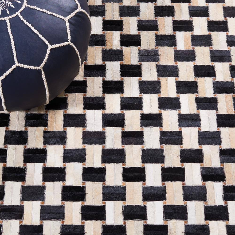 Black and Ivory Geometric Cowhide Area Rug