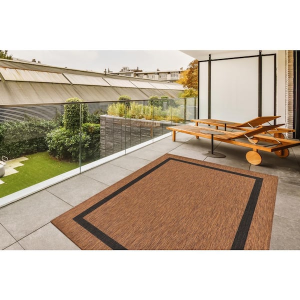 https://images.thdstatic.com/productImages/e3bf51b9-fc93-49c1-8bfe-131bec1810a7/svn/gold-black-outdoor-rugs-hd-wkk20453-4x6-c3_600.jpg