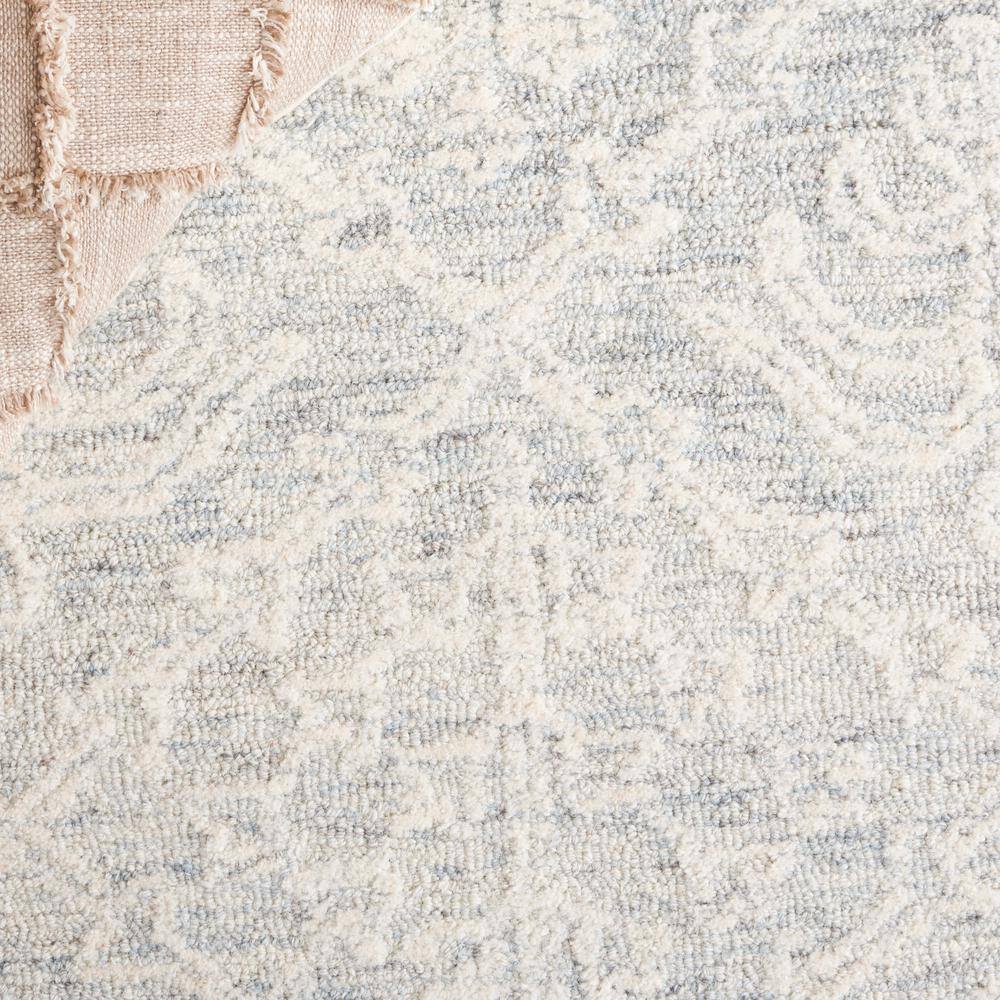 Ivory Hand Tufted Wool 4' x 6' Area Rug