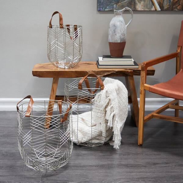 https://images.thdstatic.com/productImages/e3d157e6-ae35-5357-b3ea-80ed1bd62f16/svn/silver-cosmoliving-by-cosmopolitan-storage-baskets-042703-31_600.jpg