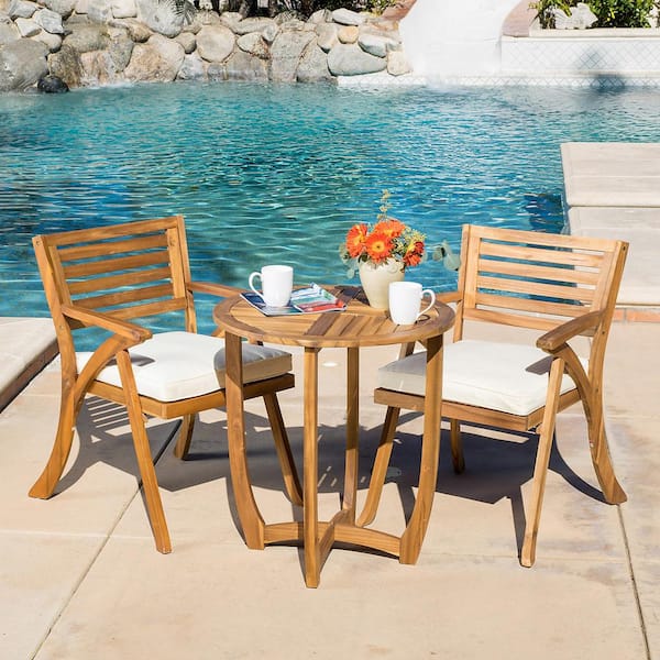 Coronado Teak Brown Finish 3-Piece Wood Round Outdoor Patio Bistro Set with Cream Cushions