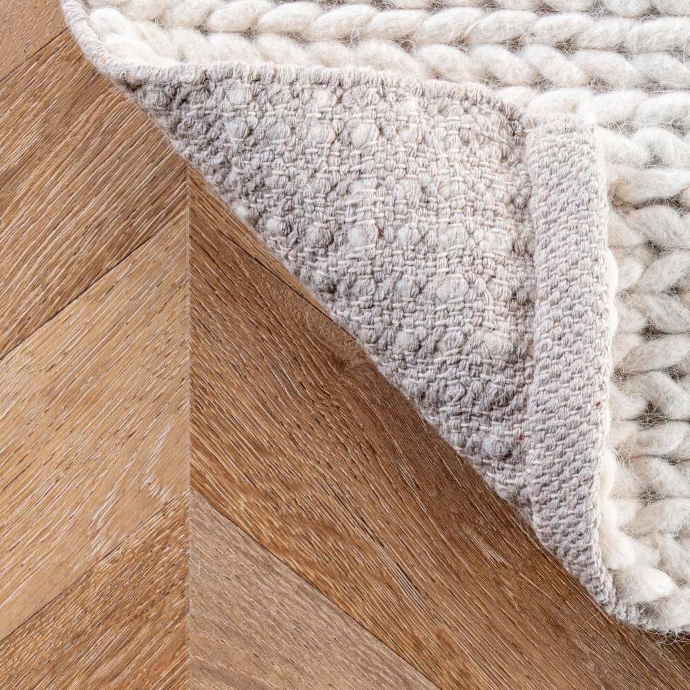 Handmade Off-White Braided Wool 4' x 6' Area Rug