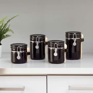 https://images.thdstatic.com/productImages/e3eb1d1d-5c89-4441-932d-18a68fa5c1c3/svn/black-home-basics-kitchen-canisters-hdc59633-64_300.jpg