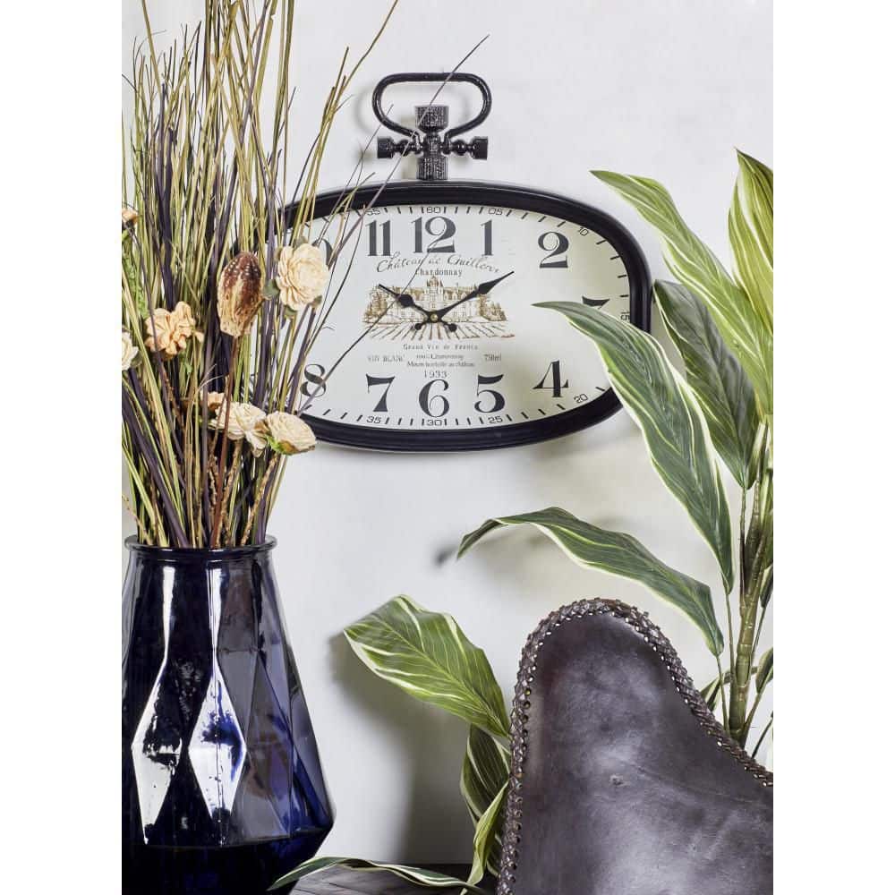 Vintage Black and White Oval Metal Wall Clock