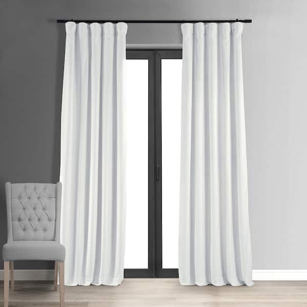 Exclusive Fabrics & Furnishings Signature Primary White Solid Velvet Rod Pocket Blackout Curtain 50 in. W x 96 in. L (1 Panel)