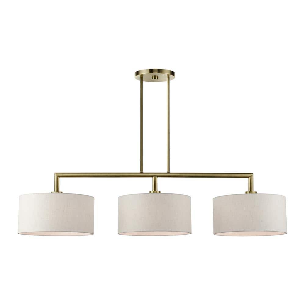 Meridian Antique Brass 3-Light Linear Chandelier with Oatmeal Shades