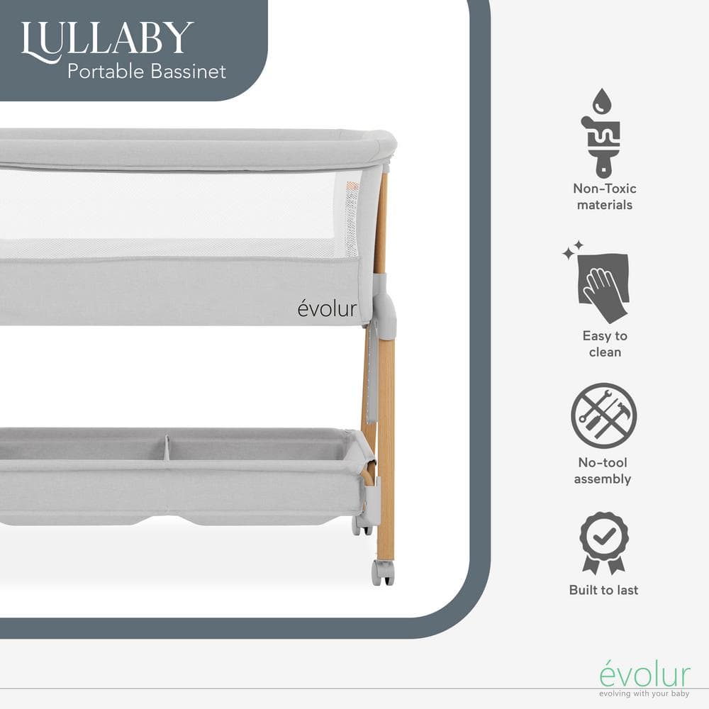 Light Gray Lullaby Portable Bassinet with wheels