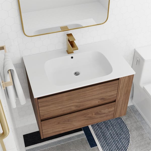 https://images.thdstatic.com/productImages/e405ead7-c93d-4ac0-b5e9-704a3c42e0e6/svn/bathroom-vanities-with-tops-up2305bcb05530-c3_600.jpg