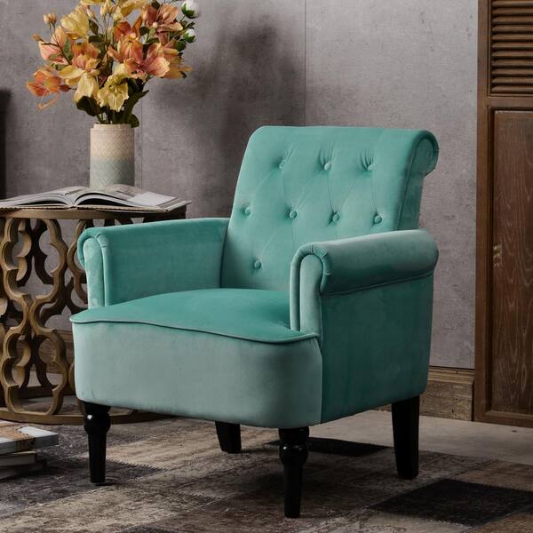 teal green armchairs