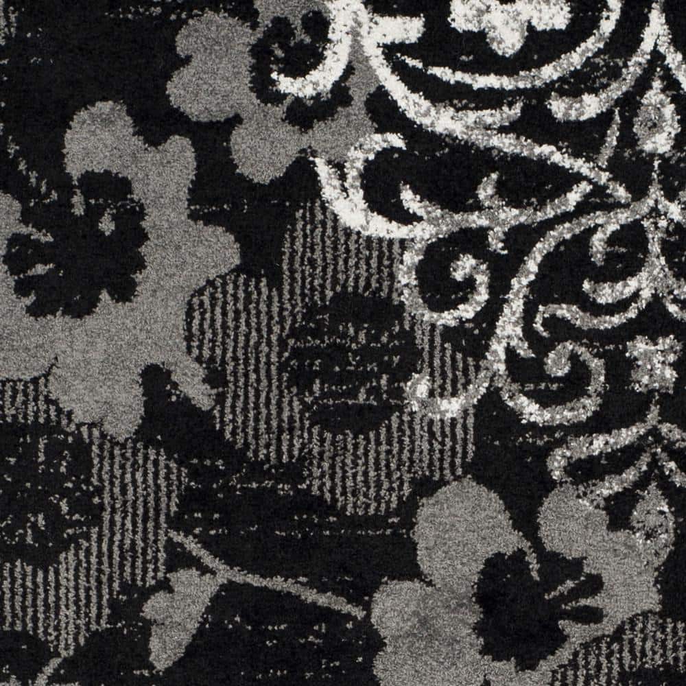 Chic Lodge 6' x 9' Hand-Knotted Black/Silver Synthetic Area Rug