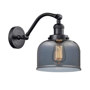 Bell 8 in. 1-Light Matte Black Wall Sconce with Plated Smoke Glass Shade