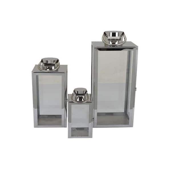 Benjara Silver Metal Decorative Lanterns with Sleek Curved Handlesand Glass Panel (Set of 3)