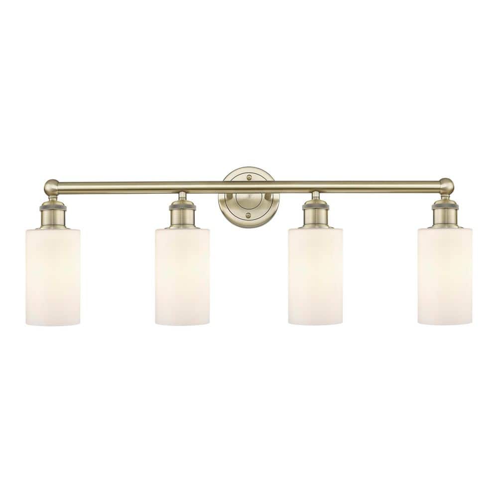 Clymer 30.88 in. 4-Light Antique Brass Vanity Light with Glass Shade price history on PriceWatchPro