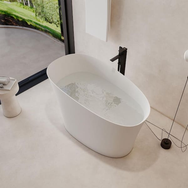 51 in. x 27.6 in. Freestanding Stone Resin Solid Surface Japanese Soaking Bathtub in Matte White with Seat