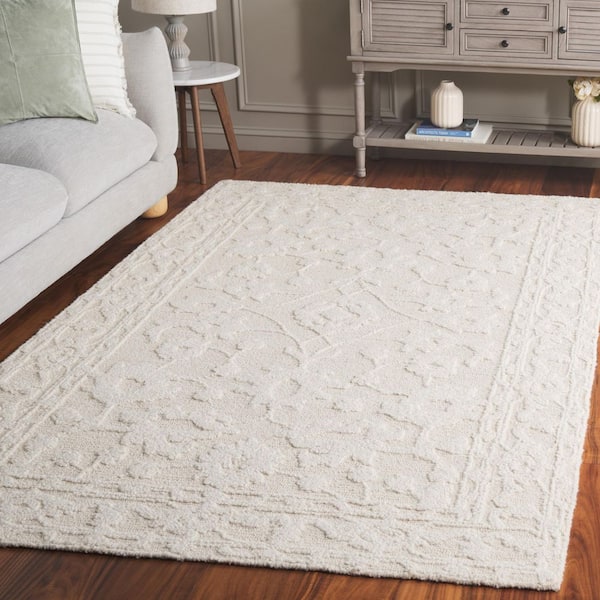 Marquee 4 ft. x 6 ft. Ivory Solid Ornate Border Area Rug