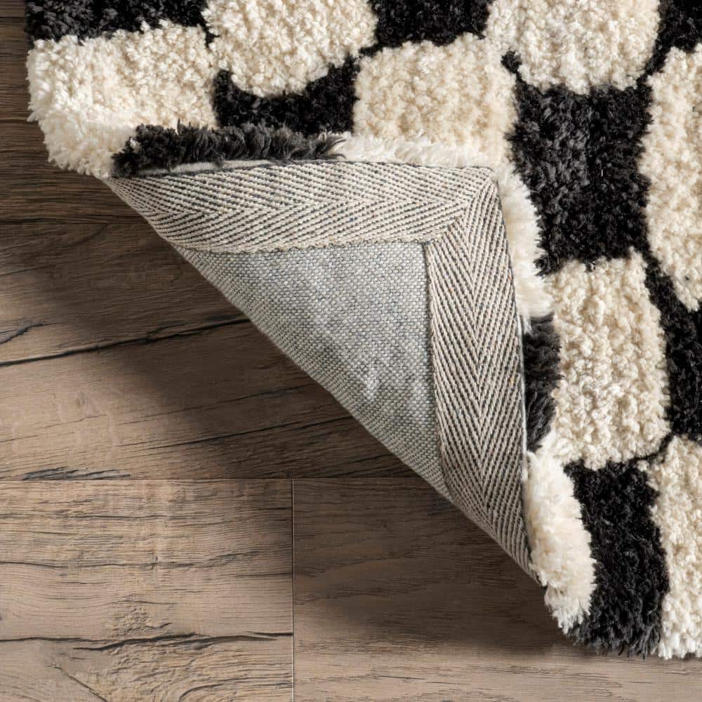 Ivory and Black Checkered Shag Synthetic Area Rug