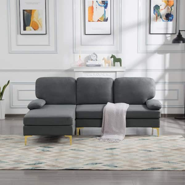 Modern style sofa with contrasting tufted back cushions