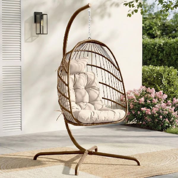 Foldable 350 lbs. 1-Person Brown Wicker Patio Swing Egg Chair with Gold Stand and Beige Cushion, Outdoor Hanging Chair