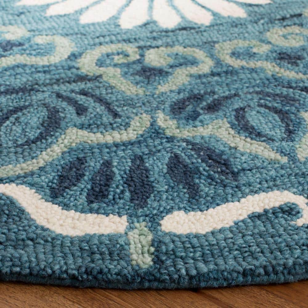 Handmade Blue and Ivory Round Wool Area Rug