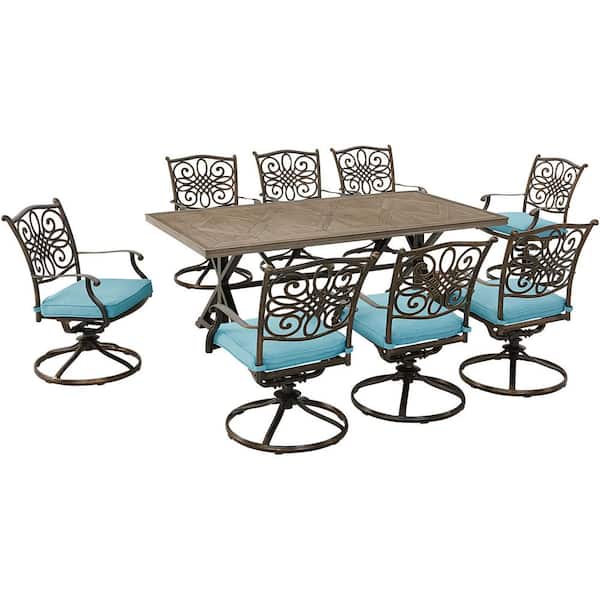Hanover Traditions 9-Piece Aluminum Outdoor Dining Set with Blue Cushions, 8 Swivel Rockers and 42 in. x 80 in. Tile Top Table