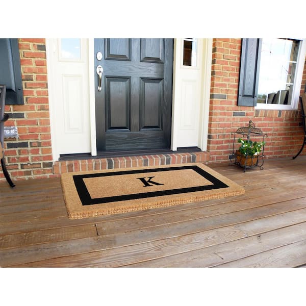 https://images.thdstatic.com/productImages/e5001c98-94b4-4dfa-a7f6-c0c17d61b5e9/svn/black-brush-nedia-home-door-mats-o2071k-31_600.jpg