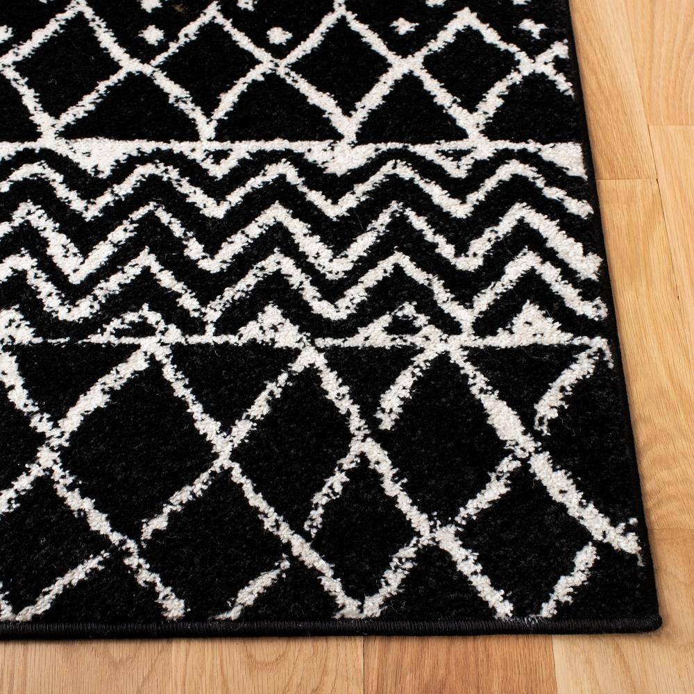 Black and Ivory Moroccan Geometric 6' x 9' Area Rug