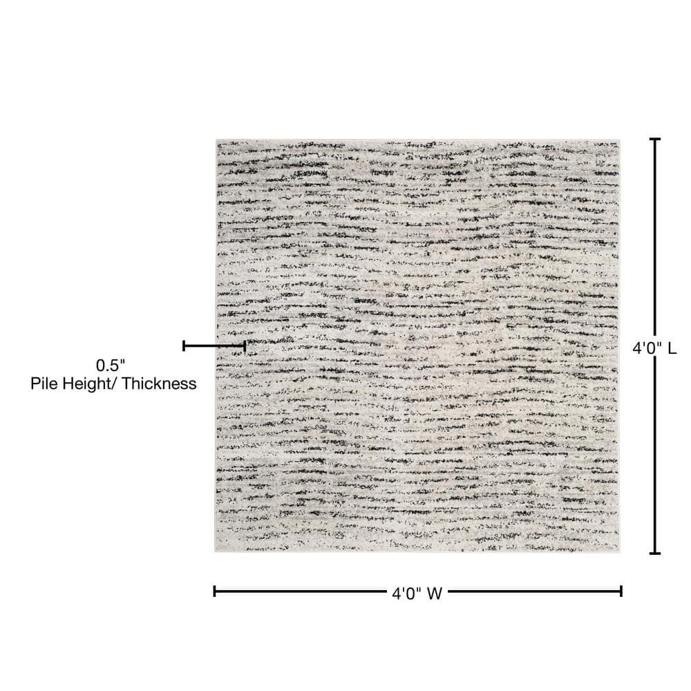 Ivory and Silver Synthetic Rectangle Area Rug, 10' x 14'