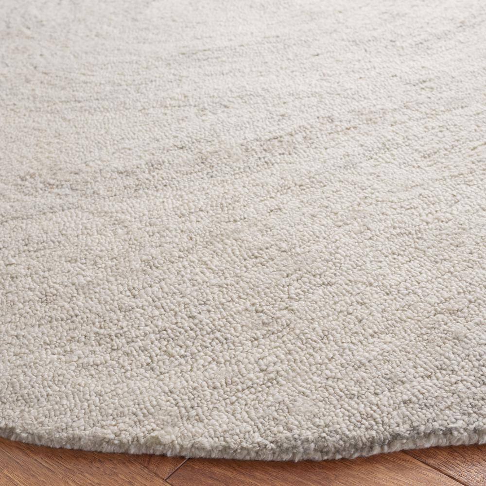 Light Grey and Beige Round Tufted Wool Rug, 6' x 6'