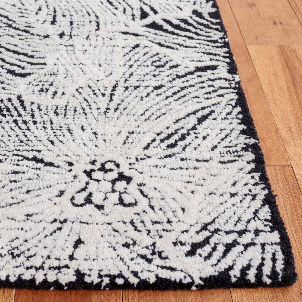 Ebony Black and Ivory Hand Tufted Wool Area Rug