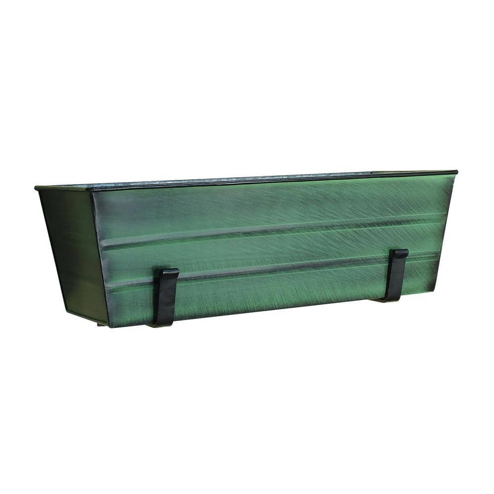 ACHLA DESIGNS 24 in. W Green Medium Galvanized Steel Flower Box with Wall Brackets Add curb appeal to a front porch, create a container garden, or decorate with seasonal plantings on a balcony or deck. This Medium Green Flower Box Kit with Wall Brackets has 2 wall-mounted brackets that simply and securely hold our Medium Green Galvanized Flower Box planter. The sturdy brackets are made from wrought iron with a durable Black powder coated Finish. For easy installation, place the 2 wall brackets at the desired width apart and secure with stainless steel screws provided. Fill the box with favorite plants and place within the brackets. Kits are available in all 4 Flower Box colors, in 3-sizes, or with top-mounted Railing Brackets.