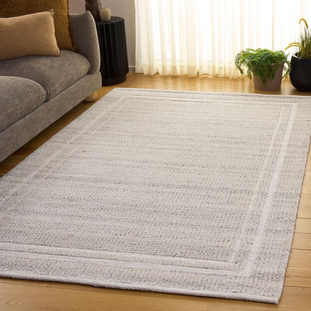 Natura 6 ft. x 9 ft. Taupe Solid Border Striped Area Rug price history on PriceWatchPro