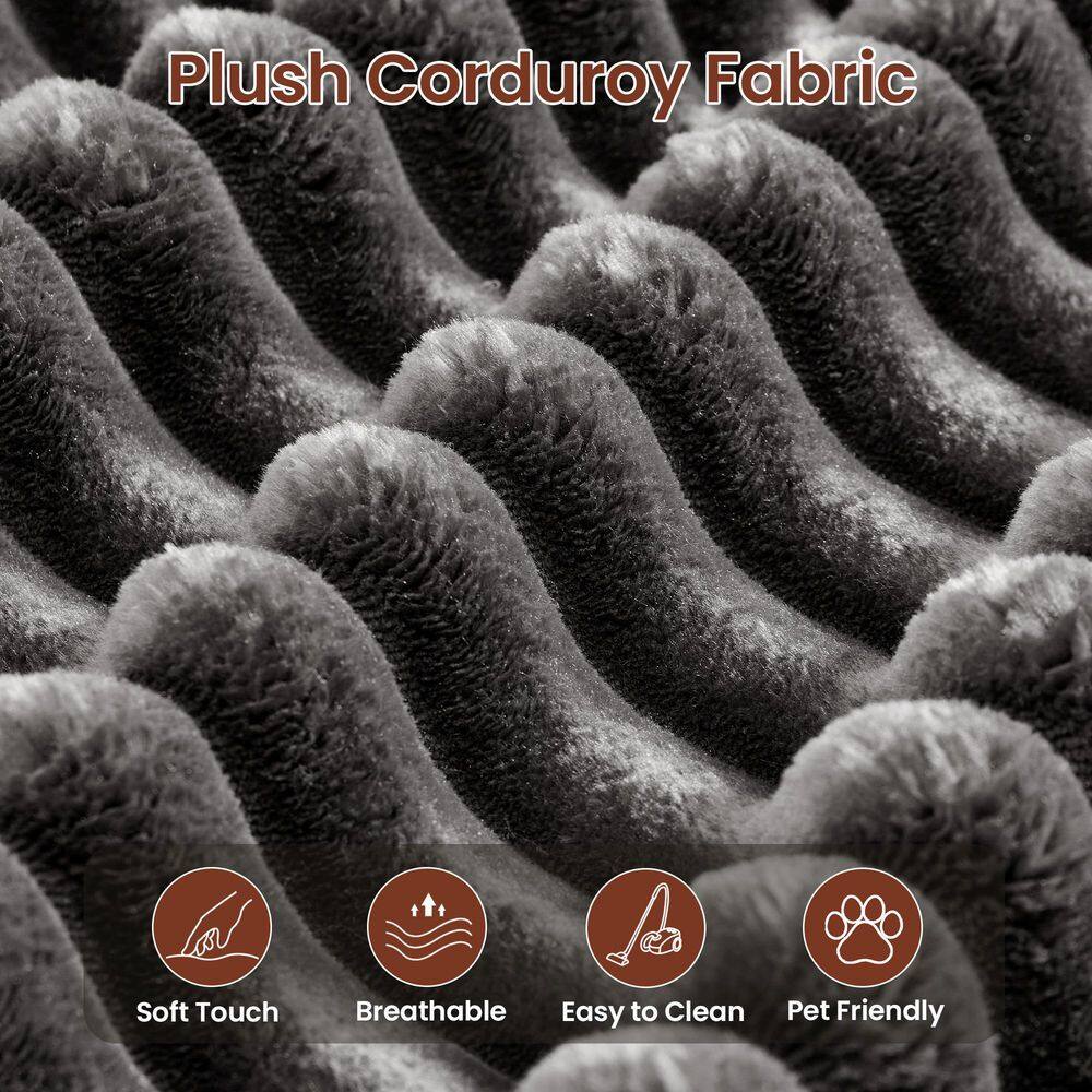 Extreme close-up of the gray plush corduroy fabric texture.