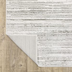 2' X 8' White And Grey Abstract Power Loom Stain Resistant Runner Rug