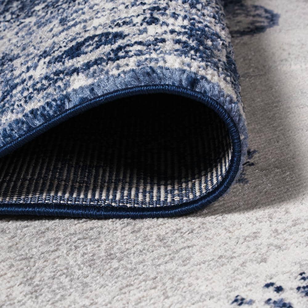 Handmade Rectangular Dark Blue/Ivory Synthetic Area Rug