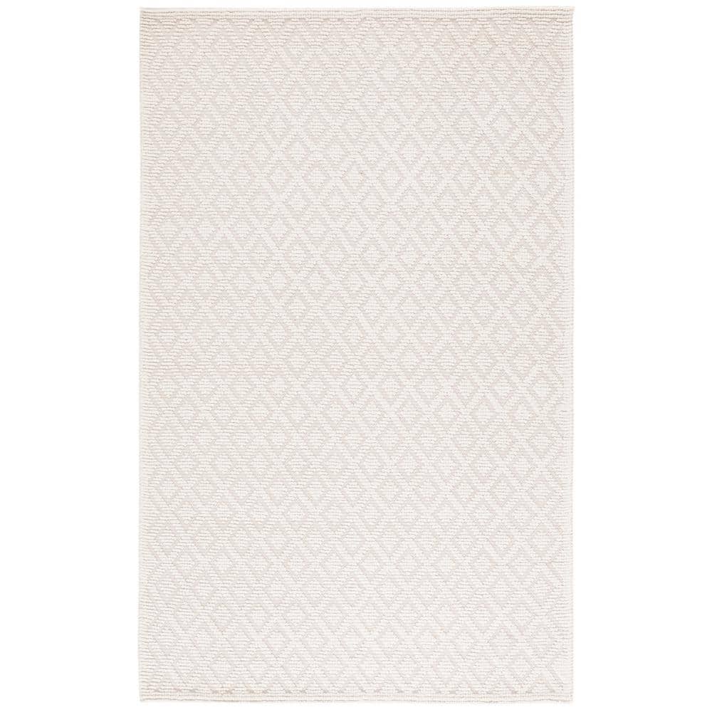Ivory Tufted Handmade Wool and Synthetic 4' x 6' Area Rug