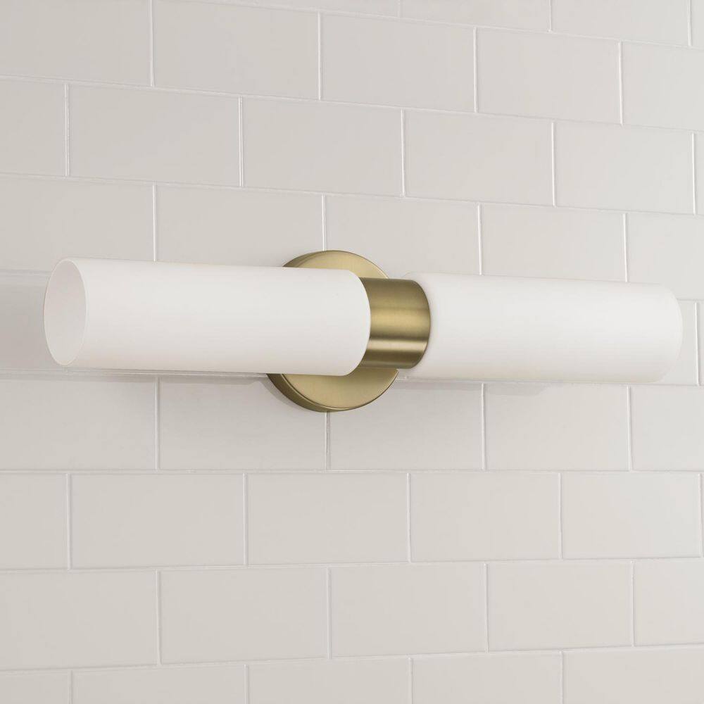 Aged Brass and White Glass Dual Cylinder Wall Sconce