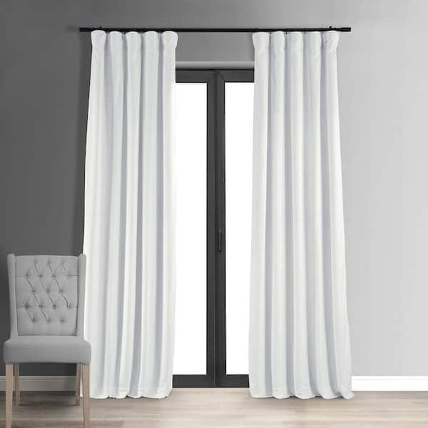 Exclusive Fabrics & Furnishings Signature Primary White Solid Velvet 50 in. W x 108 in. L Rod Pocket Blackout Curtain (1 Panel)