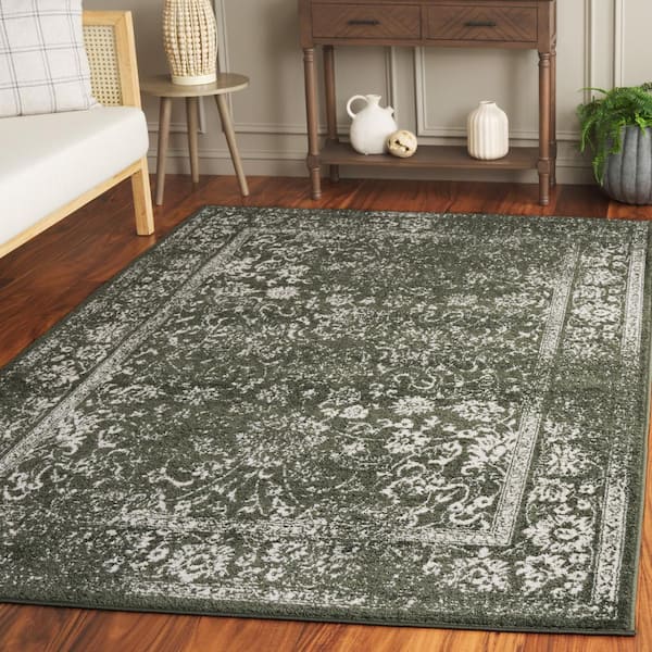 Adirondack Dark Green/Ivory 8 ft. x 10 ft. Border Distressed Area Rug