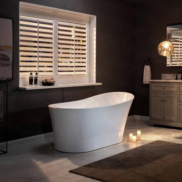 Wayne 67 in Acrylic Freestanding Single Slipper Soaking Bathtub with Drain and Overflow Included in White Wayne 67 in Acrylic Freestanding Single Slipper Soaking Bathtub with Drain and Overflow Included in White