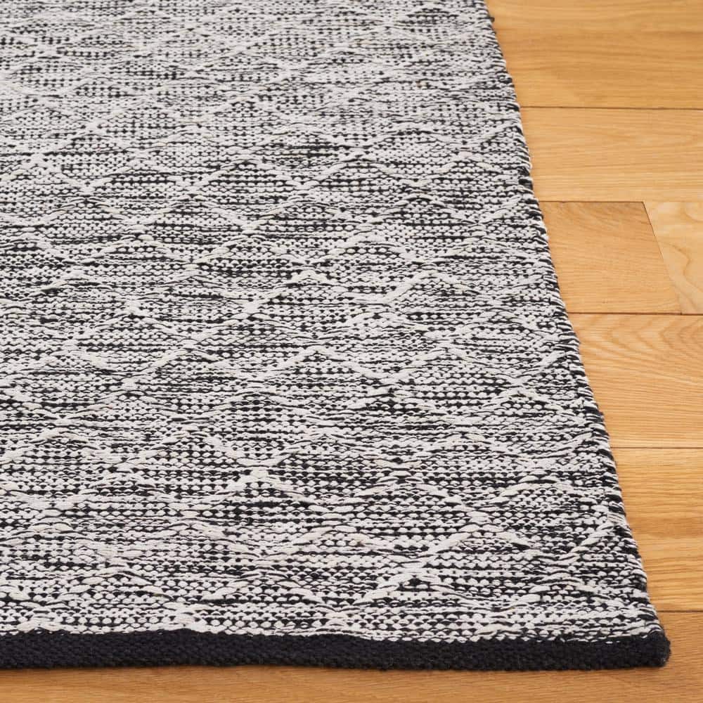 Ebony Black and Ivory Wool 6' x 9' Handmade Reversible Area Rug